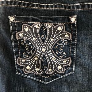 Earl Jean size 8 dark wash embellished pockets